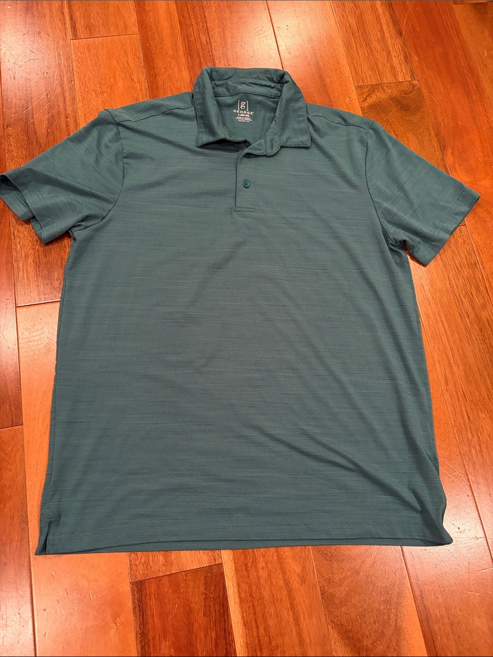 Green polo shirt